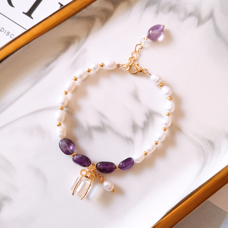Gold bracelet with purple stones and pearls Jula Jewelry