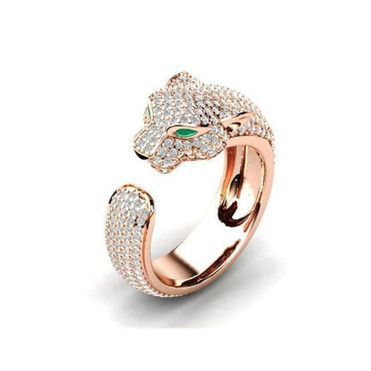Adjustable Jaguar Ring crafted from 18K Silver and 18K Rose Gold with Green Zirconia Eyes Jula Jewelry