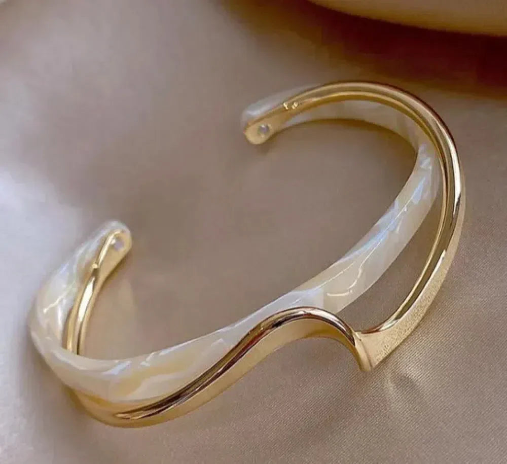 Elegant golden bracelet with white opal accents Jula Jewelry