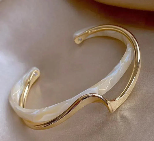 Elegant golden bracelet with white opal accents Jula Jewelry